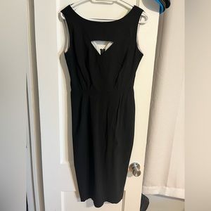 Past knee length, key hole dress